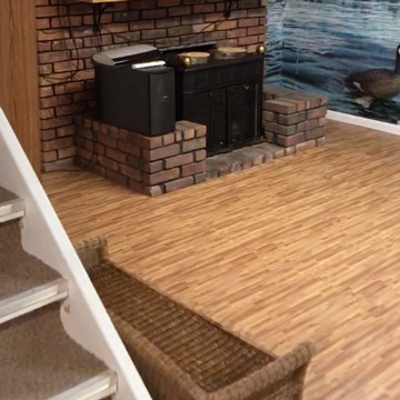 small basement flooring ideas include wood grain foam tiles