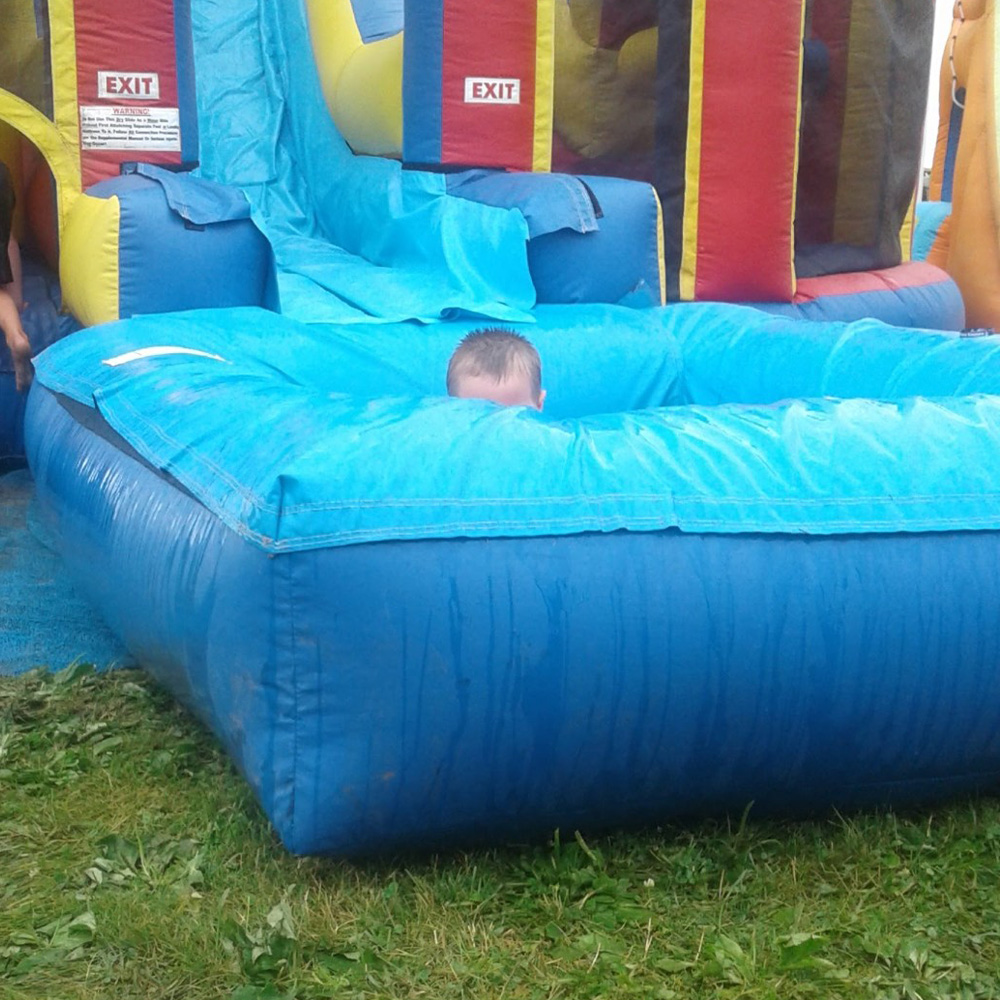 what to put under a bounce house