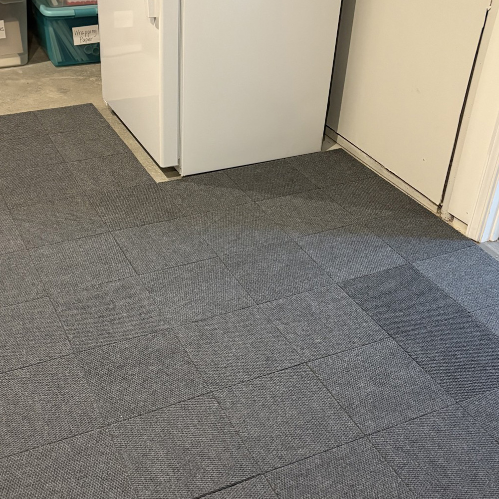 12 x 12 gray Basement Carpet Tiles over concrete by fridge