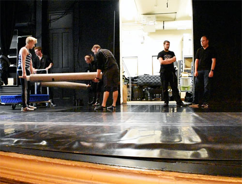 Rolling out Marley Floor over Dance Studio Subfloor Elite