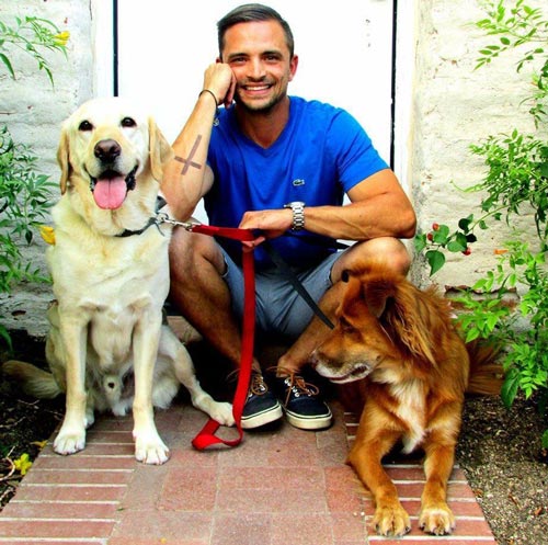 Jeremy Joseph Brown with 2 dogs outside
