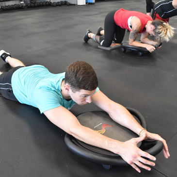 ab dolly workout on rubber gym mats