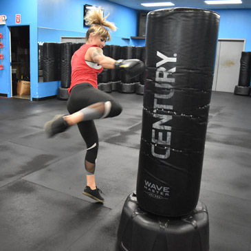 Kickboxing over 4x6 rubber gym mats