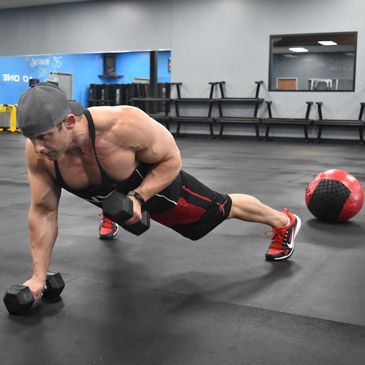 dumbbell pushups on 4x6 rubber gym mats