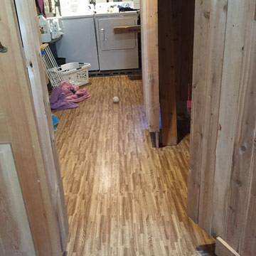 laundry room with wood grain foam tiles