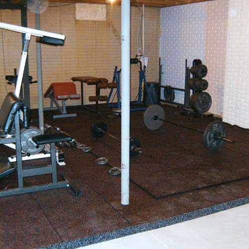 ultratile rubber weight reducers installed in basement home gym