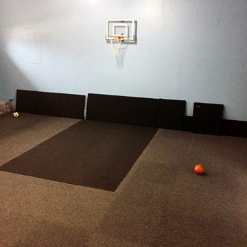Garage Game Room with Gray and Black Carpet Tiles