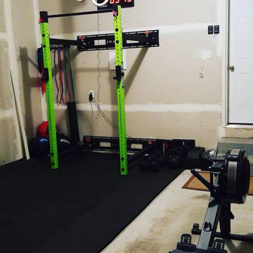 rolled rubber in garage for home gym