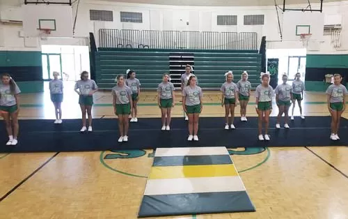 Greeneville middle school cheer team uses cheer mats for gym flooring
