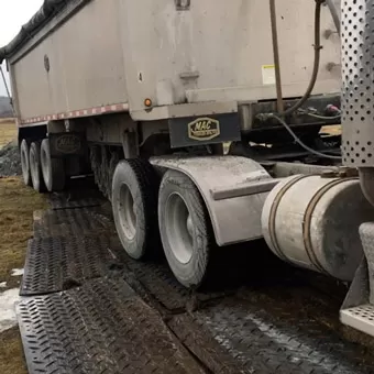 Industrial By Products uses ground protection mats in muddy areas and soft ground in the spring