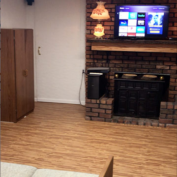 basement family room idea with foam floor tiles