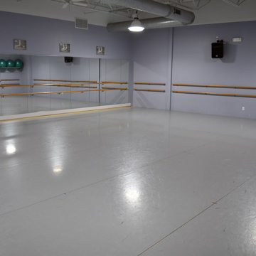 Dance Studio with rolls of marley Flooring 