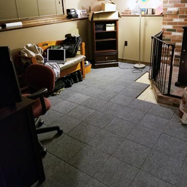 raised carpet tiles squares on concrete basement floor