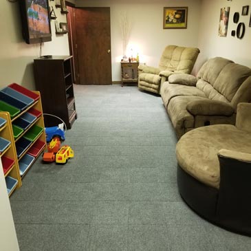 Carpet Floor Squares provide Insulation in Basement
