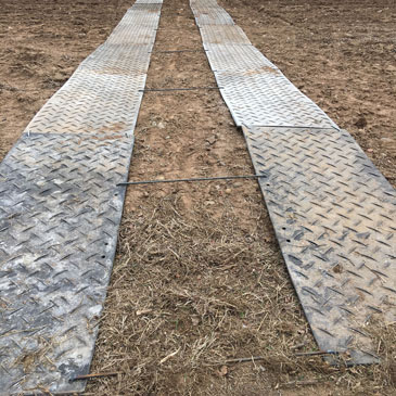 Industrial By Products Ground Protection Mats in Field