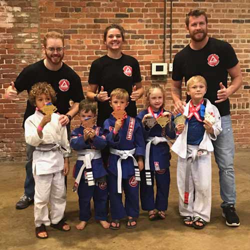 Joshua Bowlin with Students