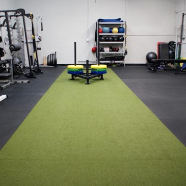 turf and rubber flooring in a health club or gym