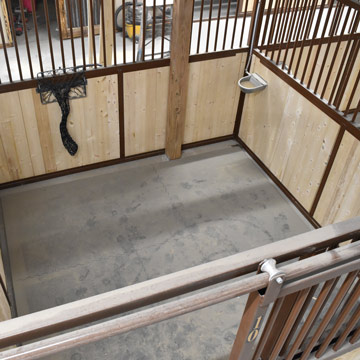 horse stall with rubber stable mats