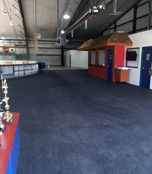 hockey arena using rubber flooring to protect skate blades