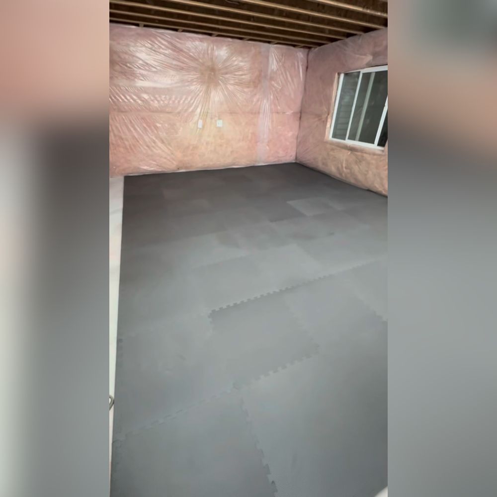 interlocking foam mats over basement concrete