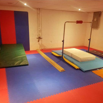 red and blue foam tile flooring for gymnastics practice