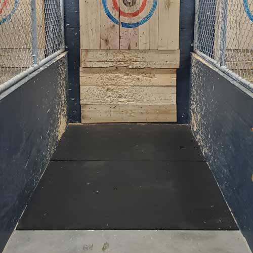 Rubber flooring for axe throwing practice stall