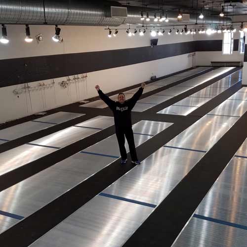 Large fencing school using rubber flooring rolls