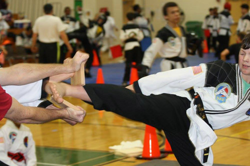board breaking with a side kick