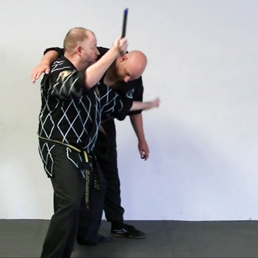Step Into Elbow Wrist Release with Weapon Aided Counter Throw