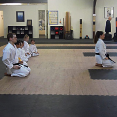 The Woodlands Shotokan Karate kneeling on Greatmats Karate Mats thumbnail