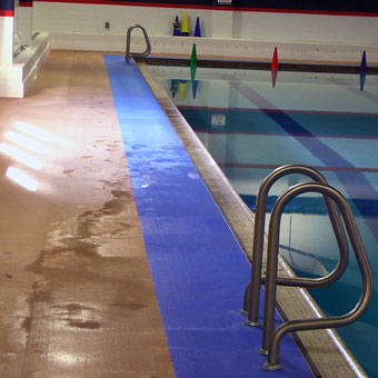 Temperature stable pool deck surface