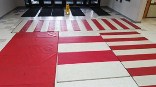 General McLane High School cheerleading mats