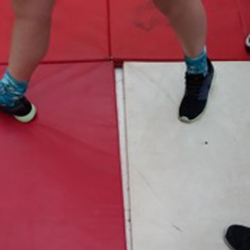 General McLane High School Cheerleading mats rip