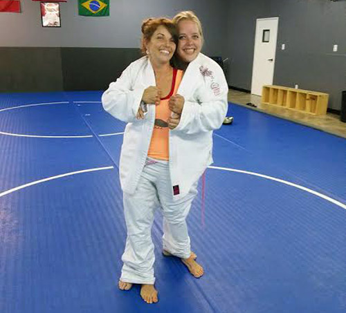 Beth and Sara both inside of Sara's first gi