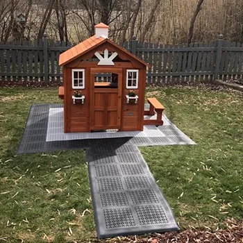 interlocking deck tiles over grass