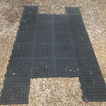 plastic pvc deck tiles over wood chips