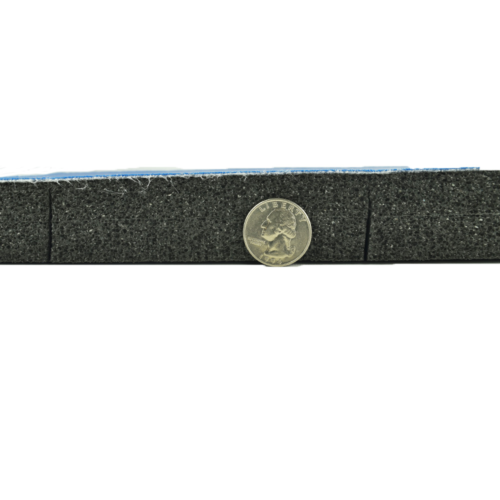 Flexi-Wall Pad Roll 1.25 Inch thickness comparison with quarter