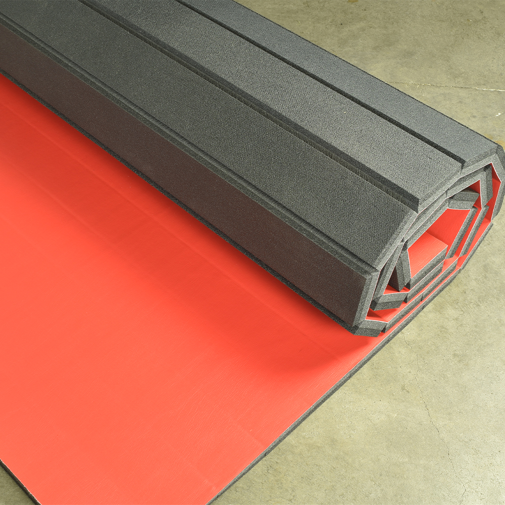 Home Wrestling Flexi-Roll Mat Smooth Surface without Marks 1-1/4 Inch x 10x10 Ft. red mat rolled over concrete