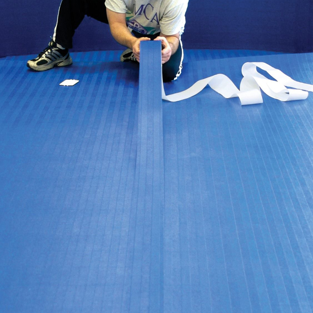  Installing royal blue mats with Flexi-Roll Seam Tape with Tatami Texture 4 Inch x 65 Ft.