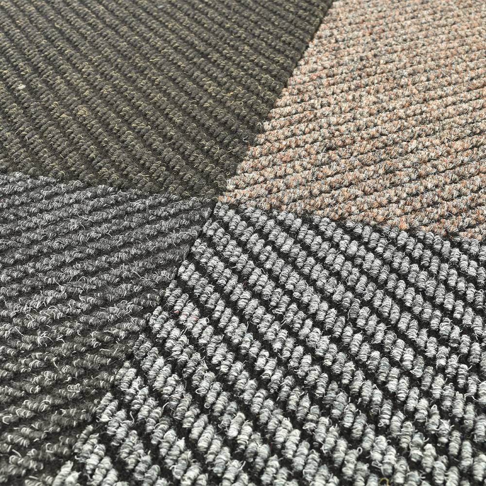 Close up of 4 Dominator LP Carpet Tiles
