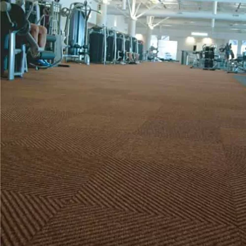 commercial gym with carpet tile flooring