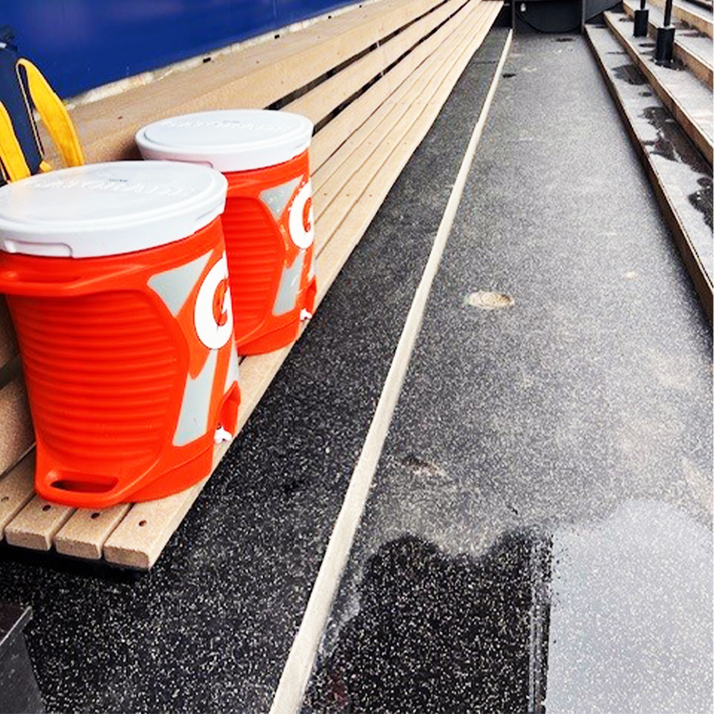 blade rolled rubber installed in baseball field dugout 