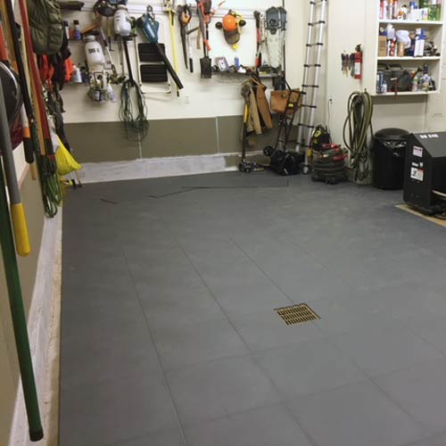vehicle jacks can be used on garage floor tiles 