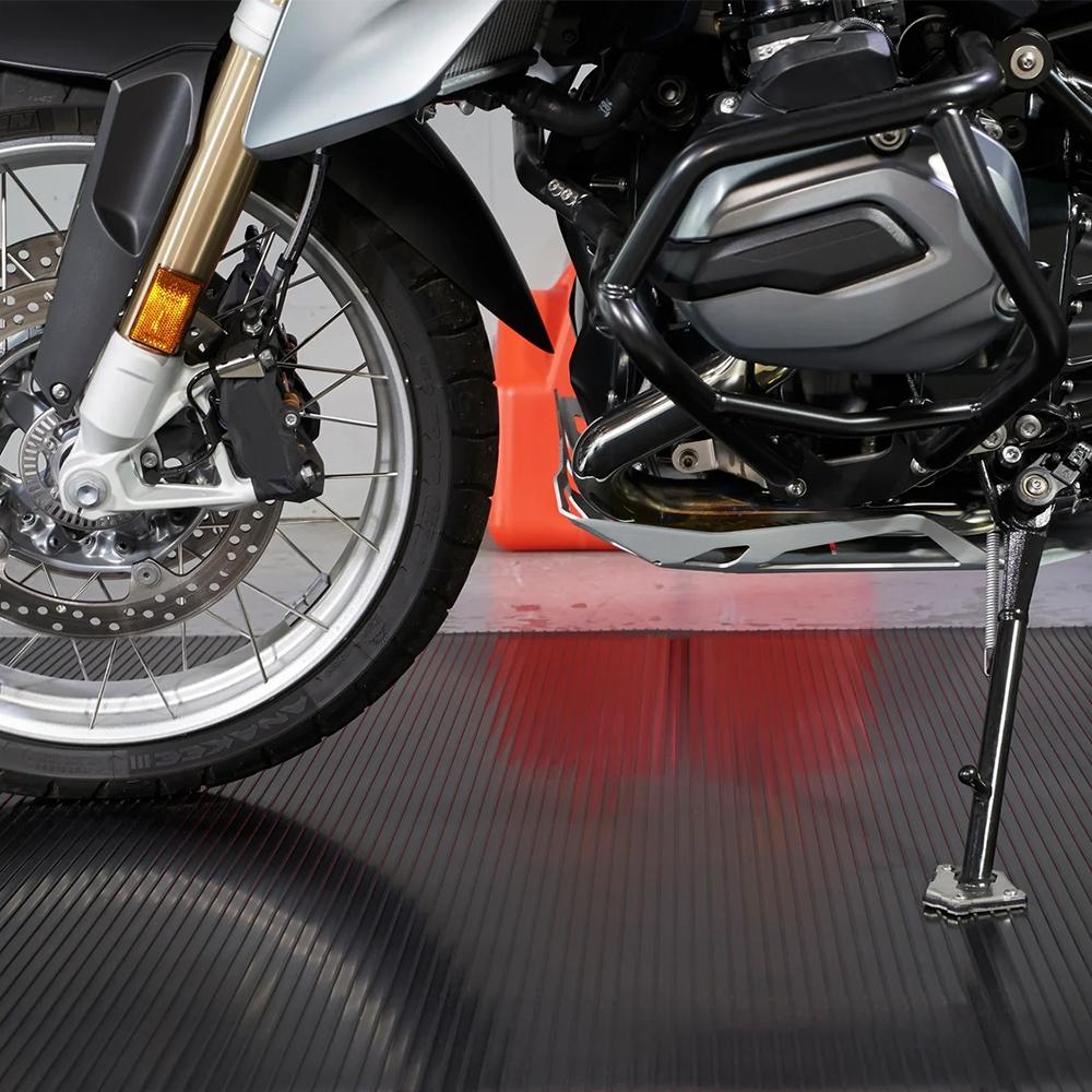 G-Floor Ribbed Tread Vinyl Multipurpose Roll 55 mil x 5x10 Ft. in black with motorcycle