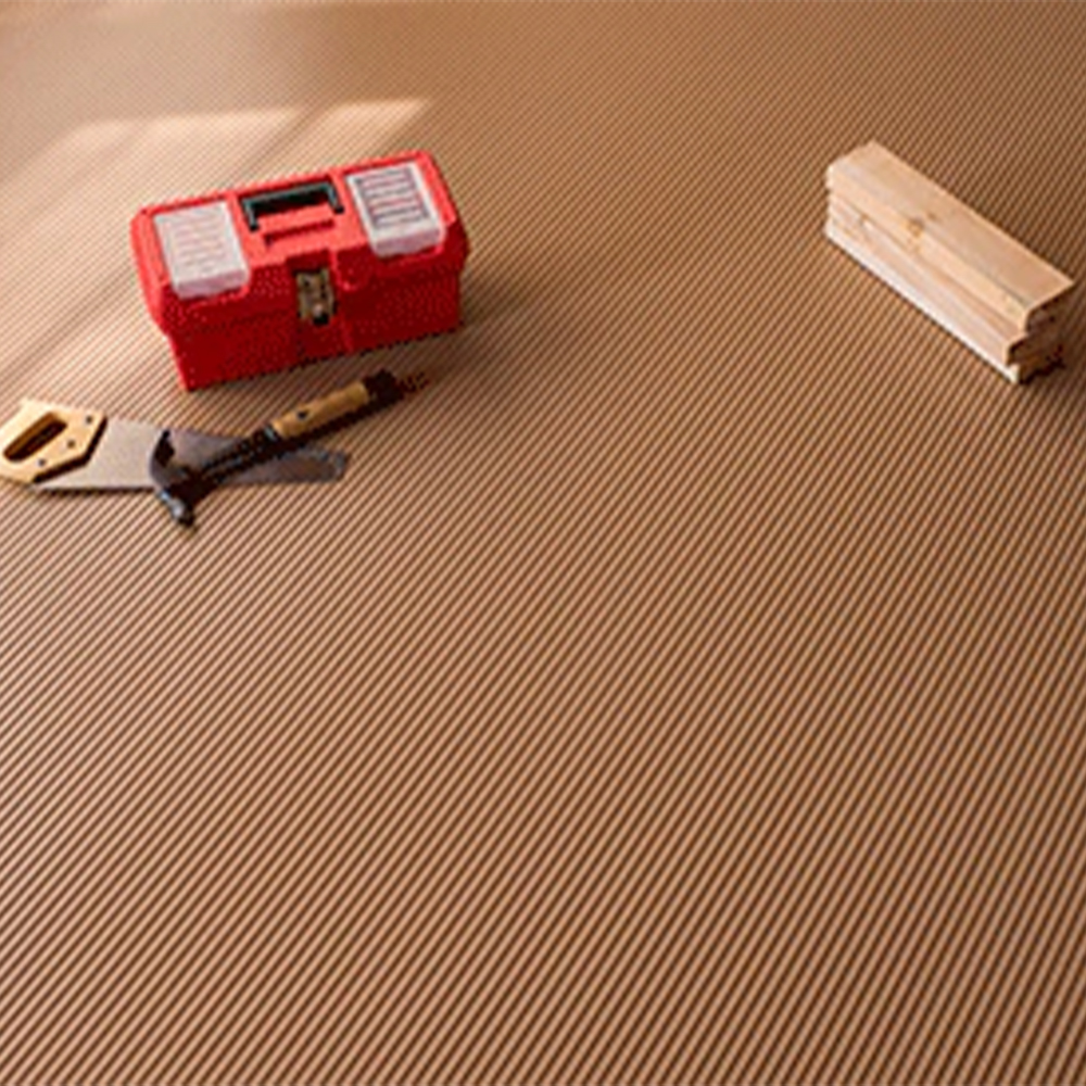 Sandstone G-Floor Ribbed Tread Vinyl Multipurpose Roll 55 mil x 5x10 Ft. with carpenter tools
