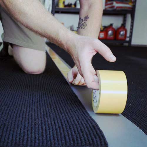 Waterproof backed carpet rolls of garage floor mats