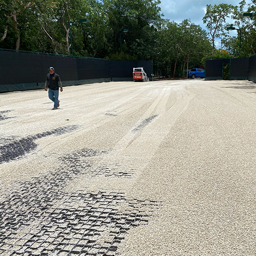filling geogrid driveway system with rock
