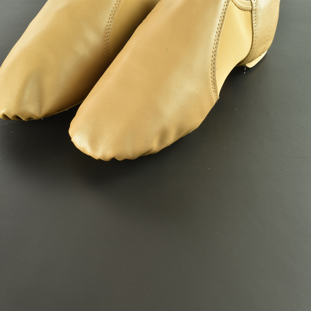 Close up of dance shoes on Vario Beat 160 Reversible Dance Floor 1.6 mm x 5.25x101.7 Ft.