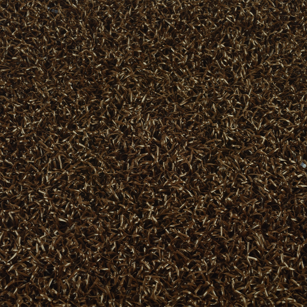 close up of brown colored baseball home plate mat