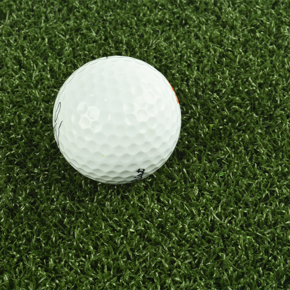 Bermuda Artificial Grass Turf Pine Green with golf ball